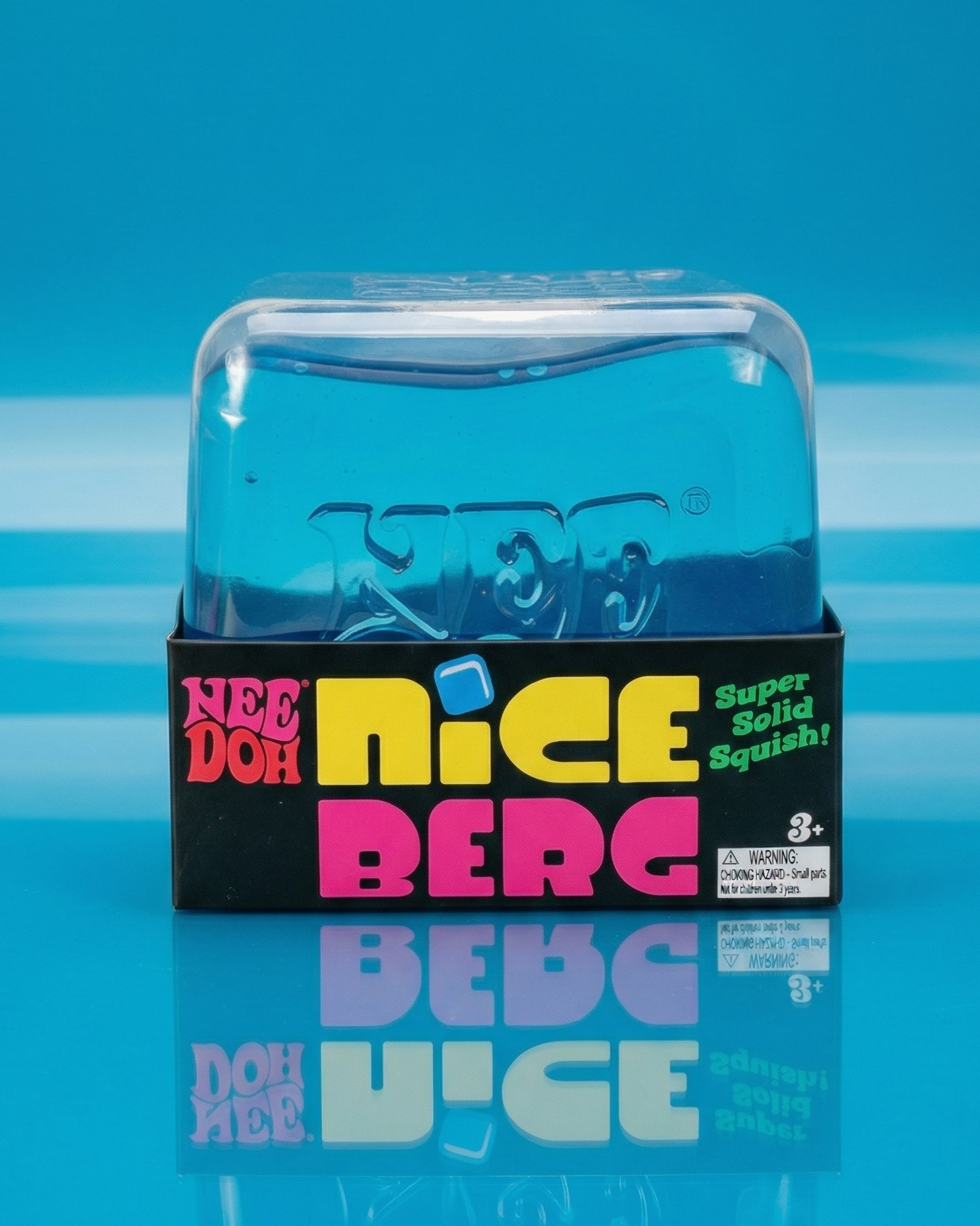 Clear blue gel sensory toy with colorful packaging on a blue background