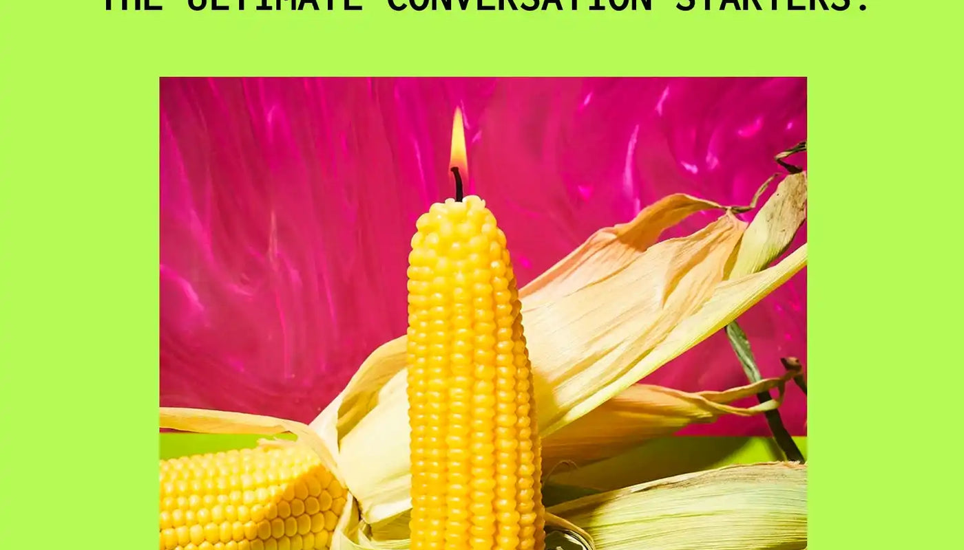 A corn cob turned into a candle with a lit wick.