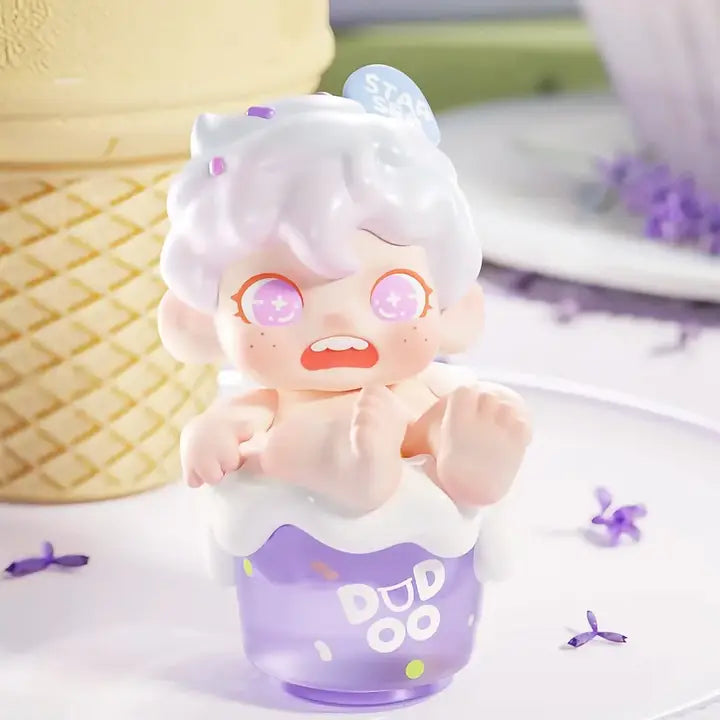 Toy figure with white hair and purple outfit on a light background