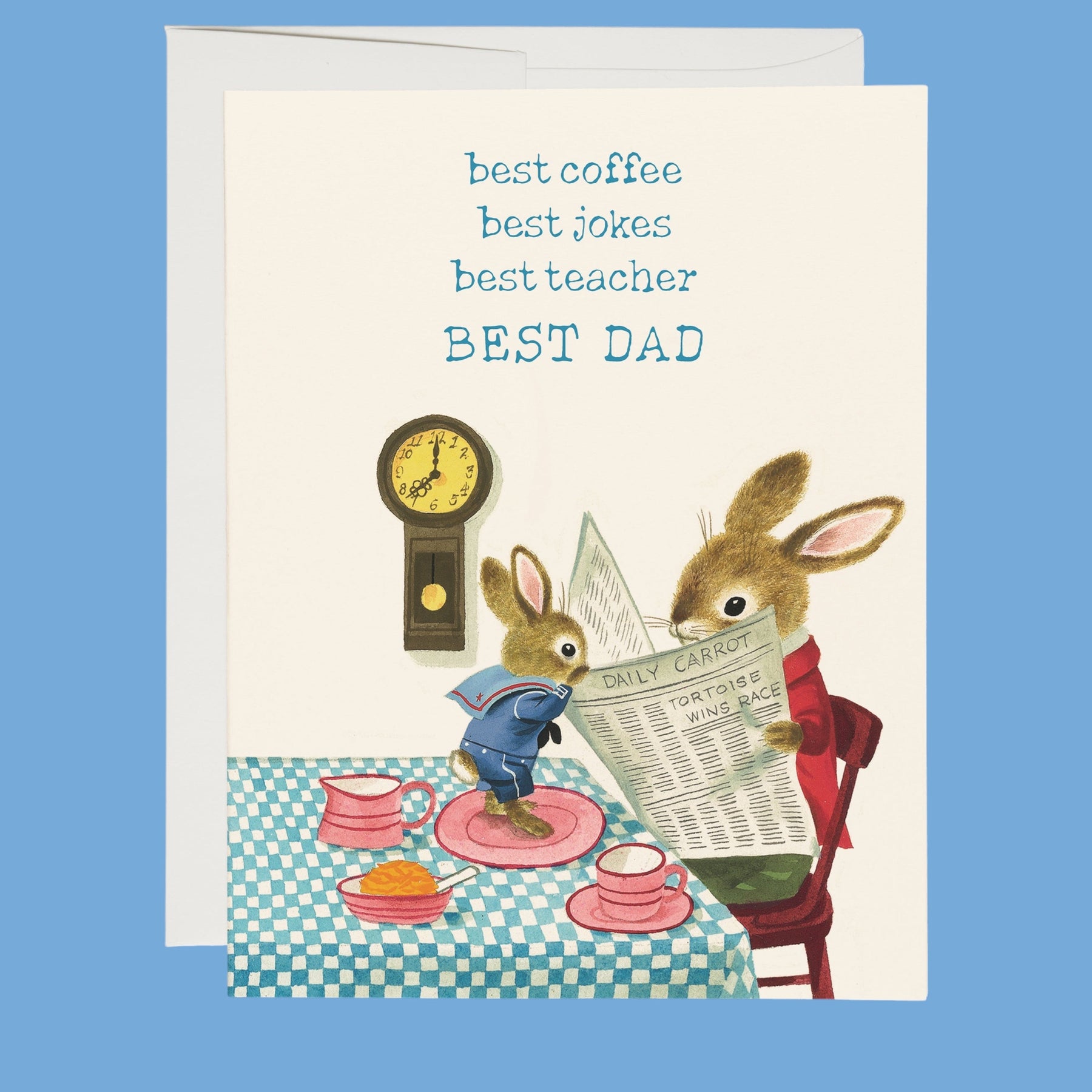 Greeting card with two bunnies at a table, one reading a newspaper and the other looking at a clock, with text 'best coffee, best jokes, best teacher, BEST DAD' on a blue background.