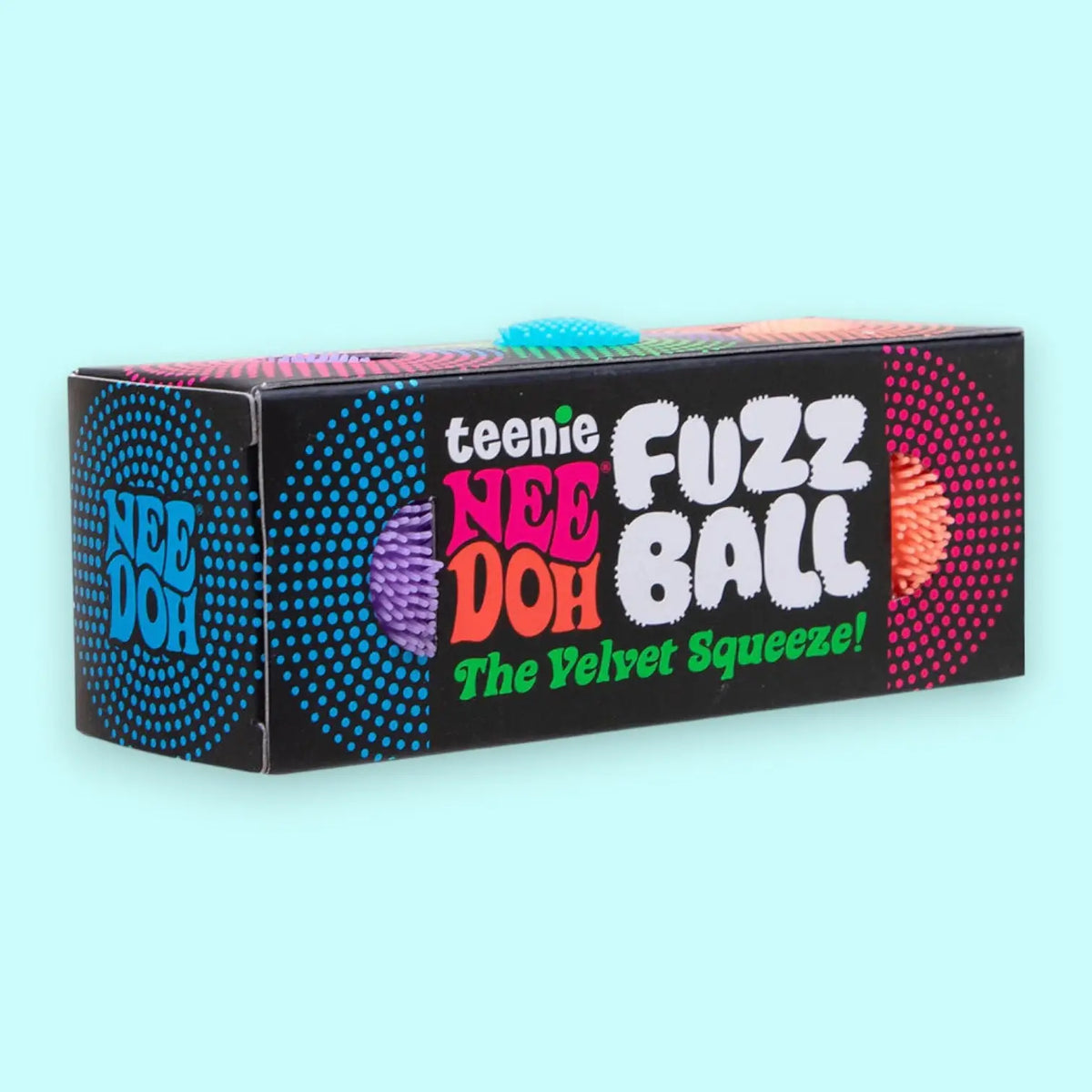 Box of Teenie Nee Doh Fuzz Ball on a light blue background