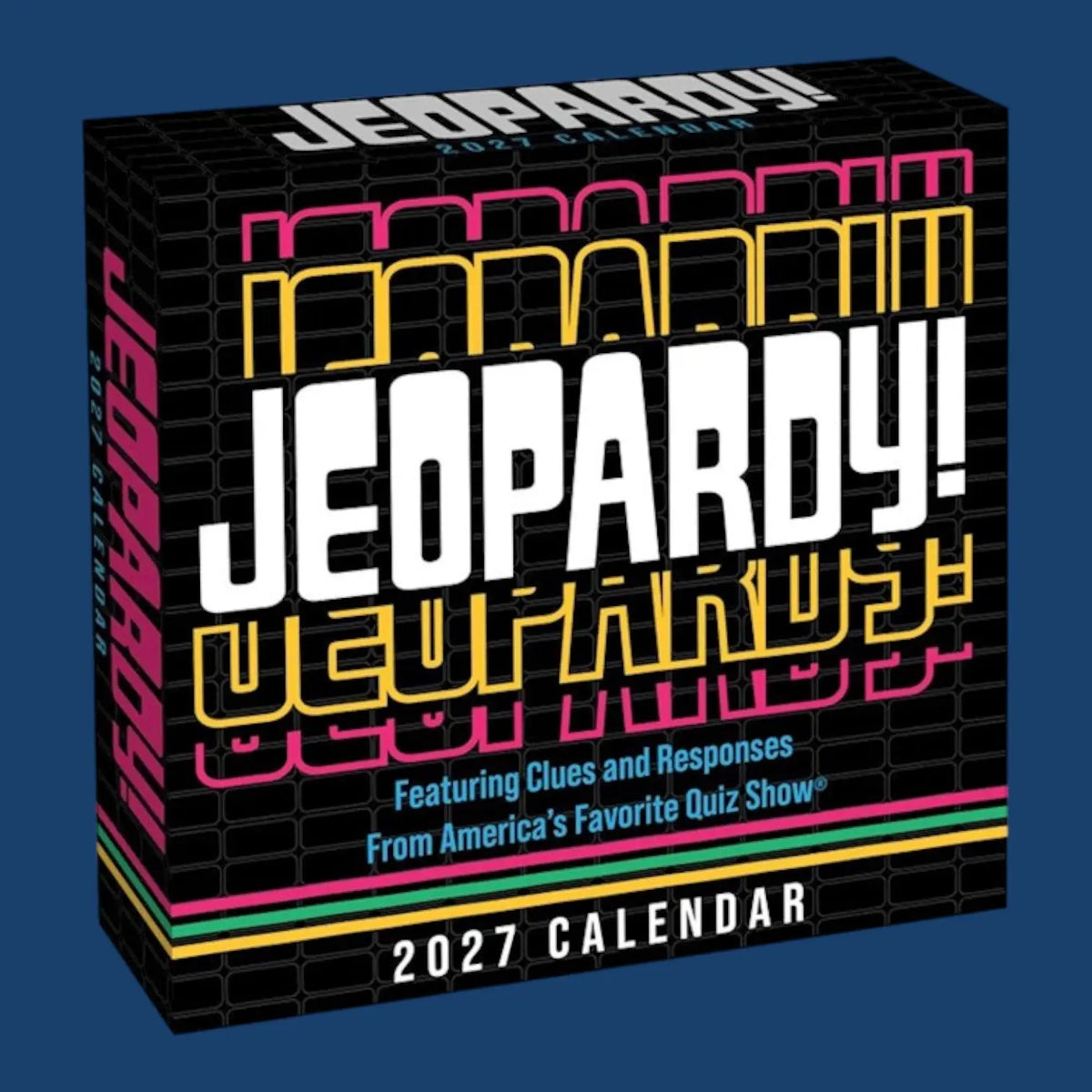 A 2027 Jeopardy! calendar box shown at an angle against a solid dark blue background. The box is black with a subtle grid pattern and features the word 'JEOPARDY!' in large white letters, with 'JEOPARDY! CHAMPIONS' in yellow and 'JEOPARDY! CHAMPIONS' in pink accents.