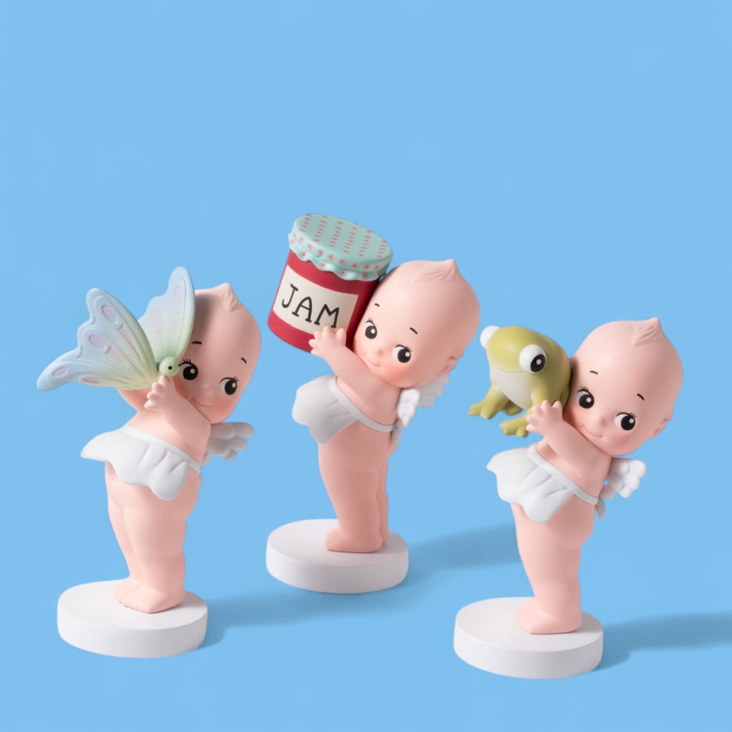 Kewpie Doll Holding Things | Friends NYC Brooklyn, NY