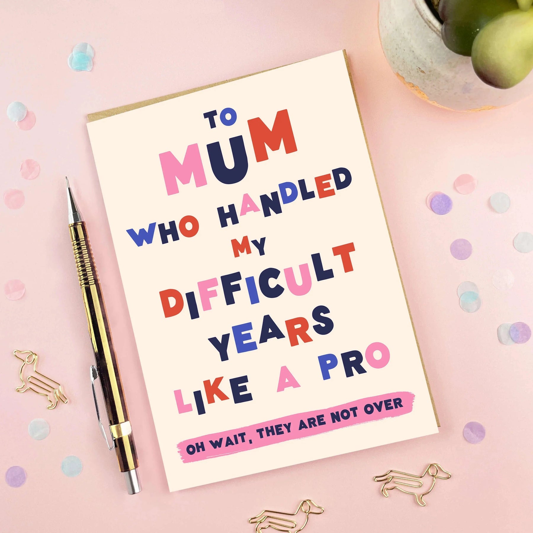 Greeting card for mum on a pink background with decorative elements