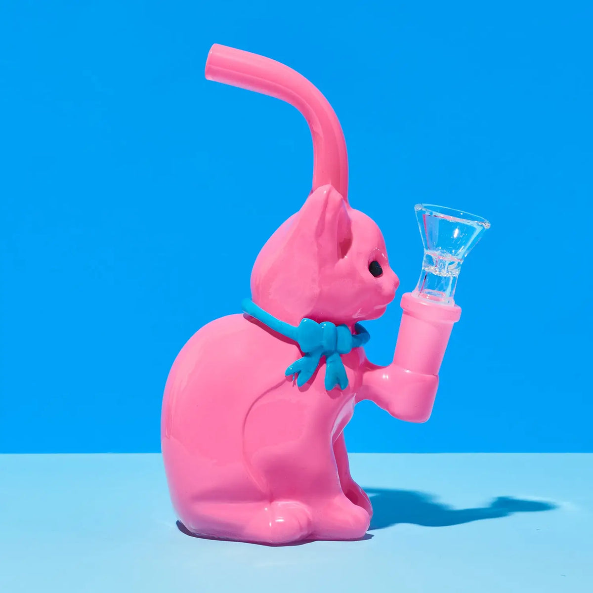 Pink cat-shaped bong with a blue bow