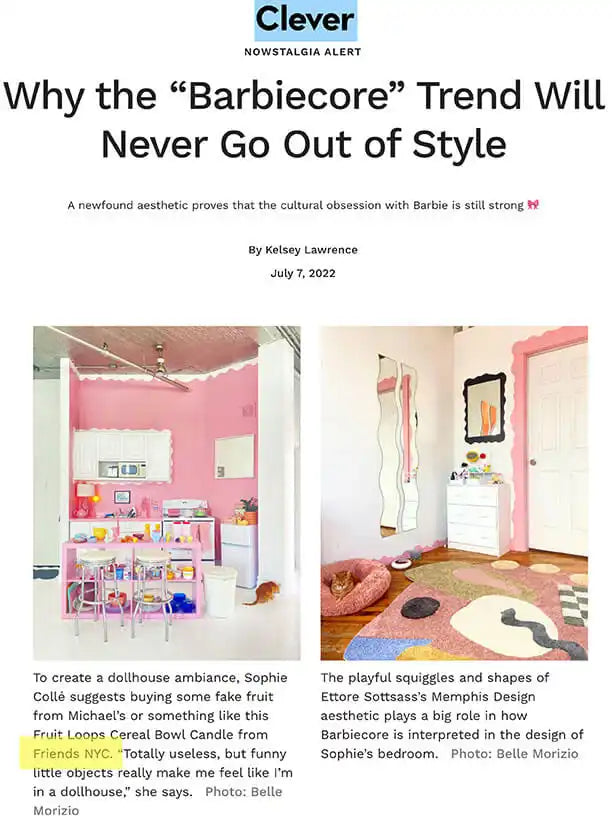 Article screenshot about the ’Barbiecore’ trend featuring pink interior design photos.