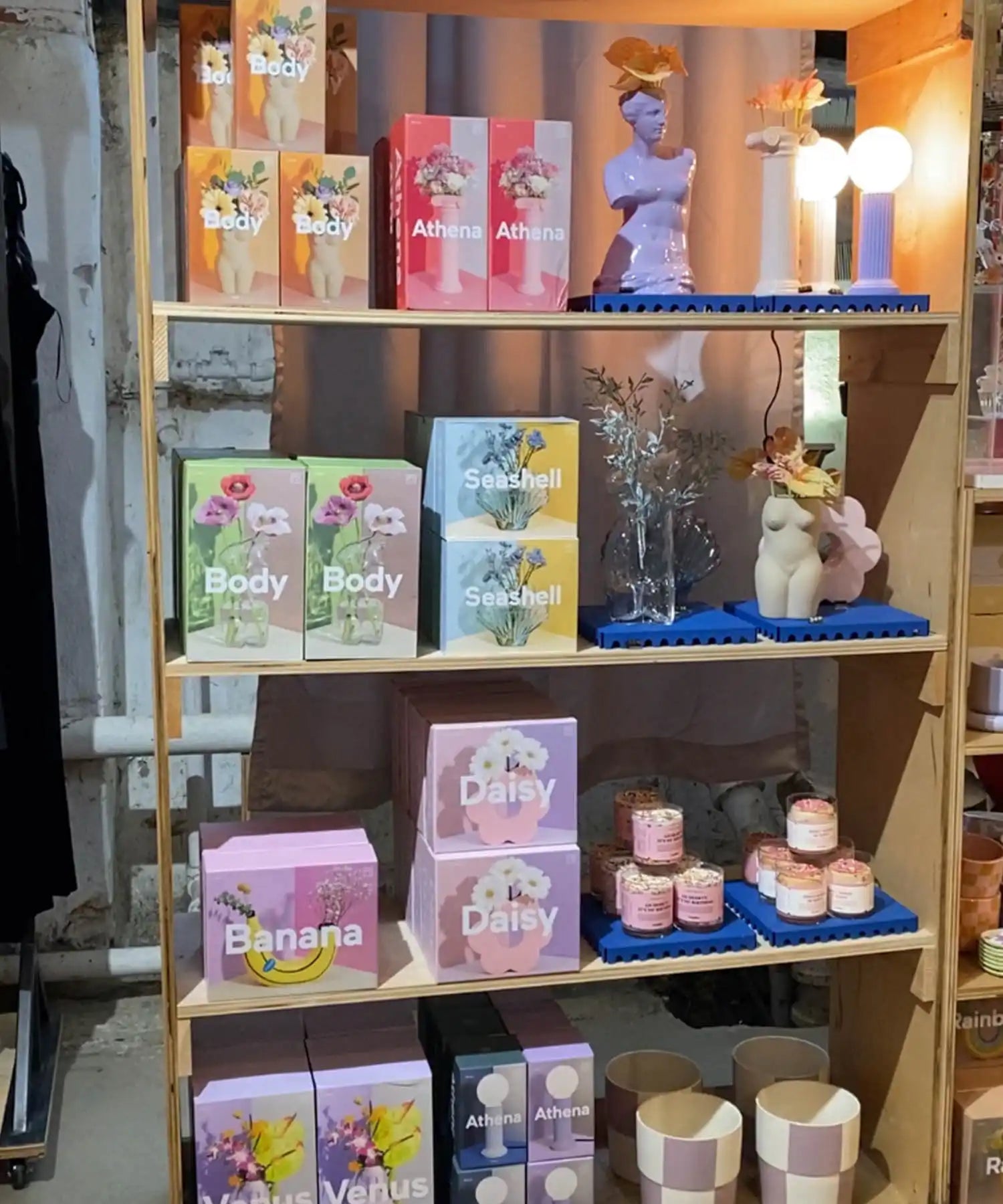 Display shelf stocked with colorful beauty or bath products.