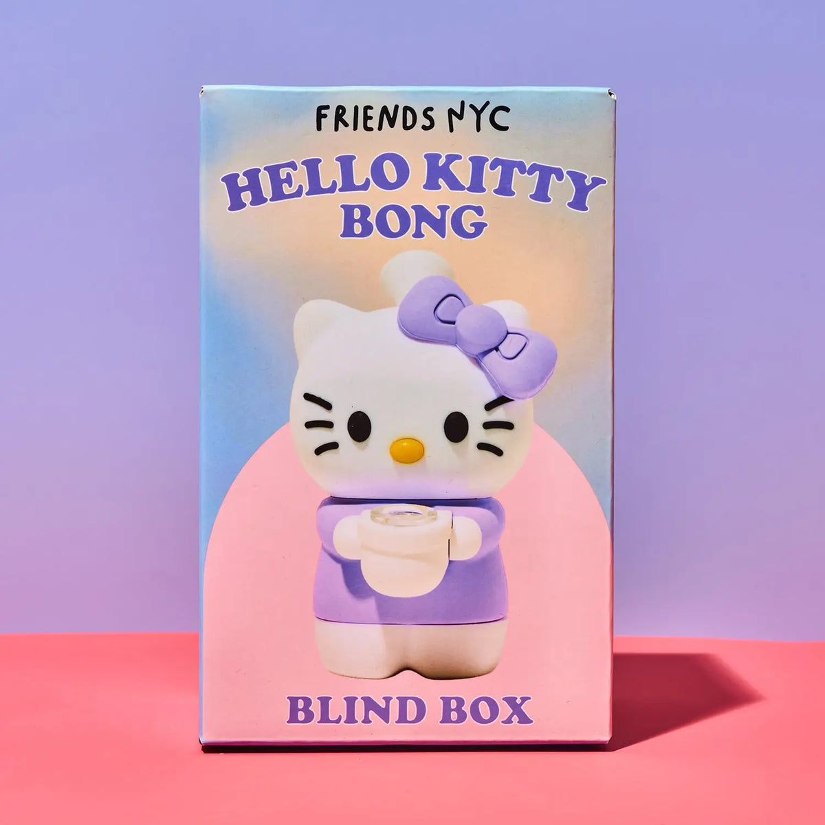 Friends NYC Hello Kitty Bong Blind Box Packaging on a pink table with a purple background