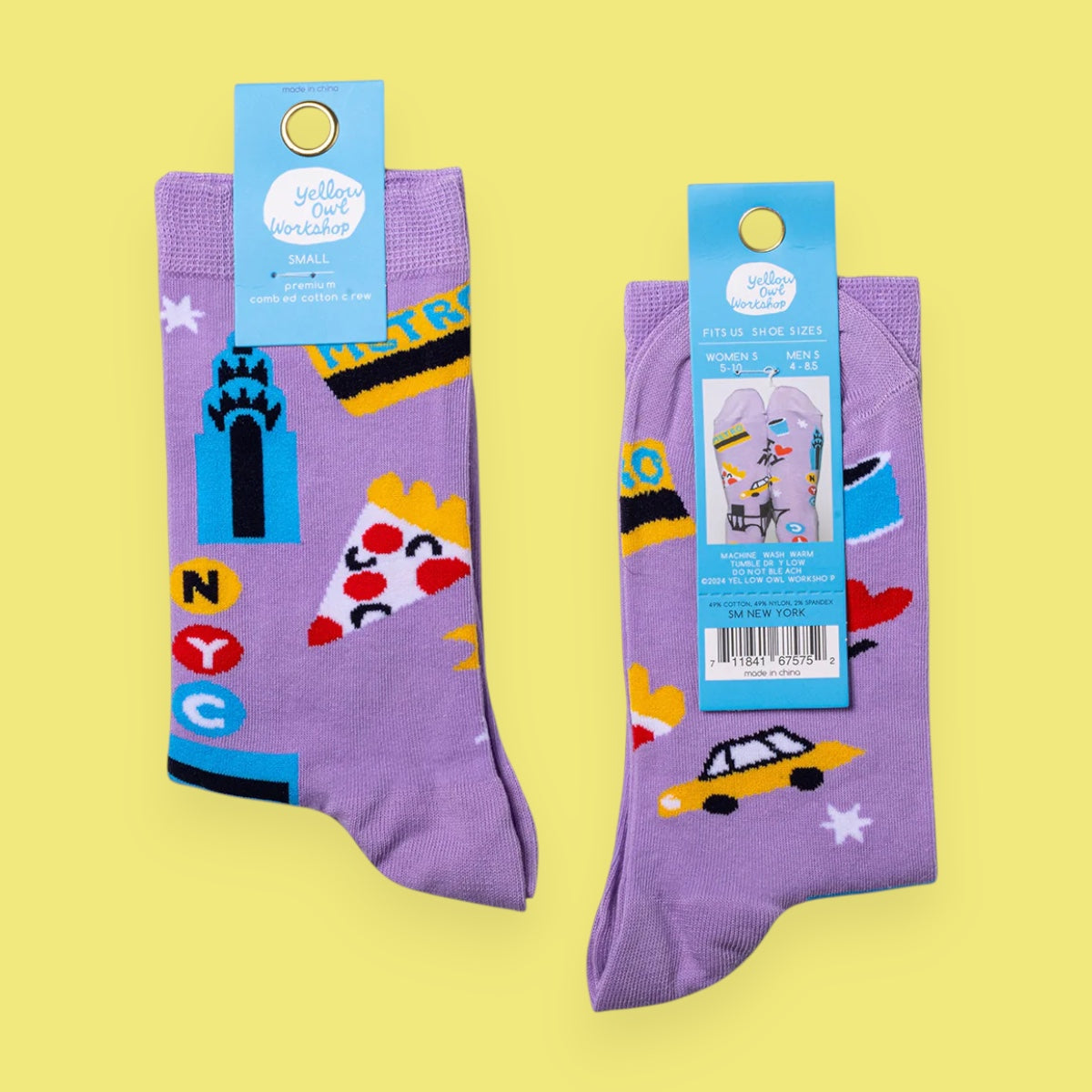 Purple socks with colorful designs and packaging on a yellow background