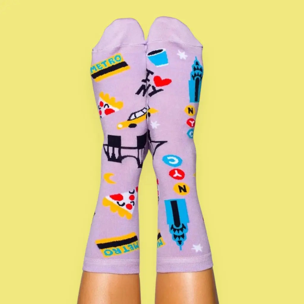 Colorful patterned socks on a yellow background