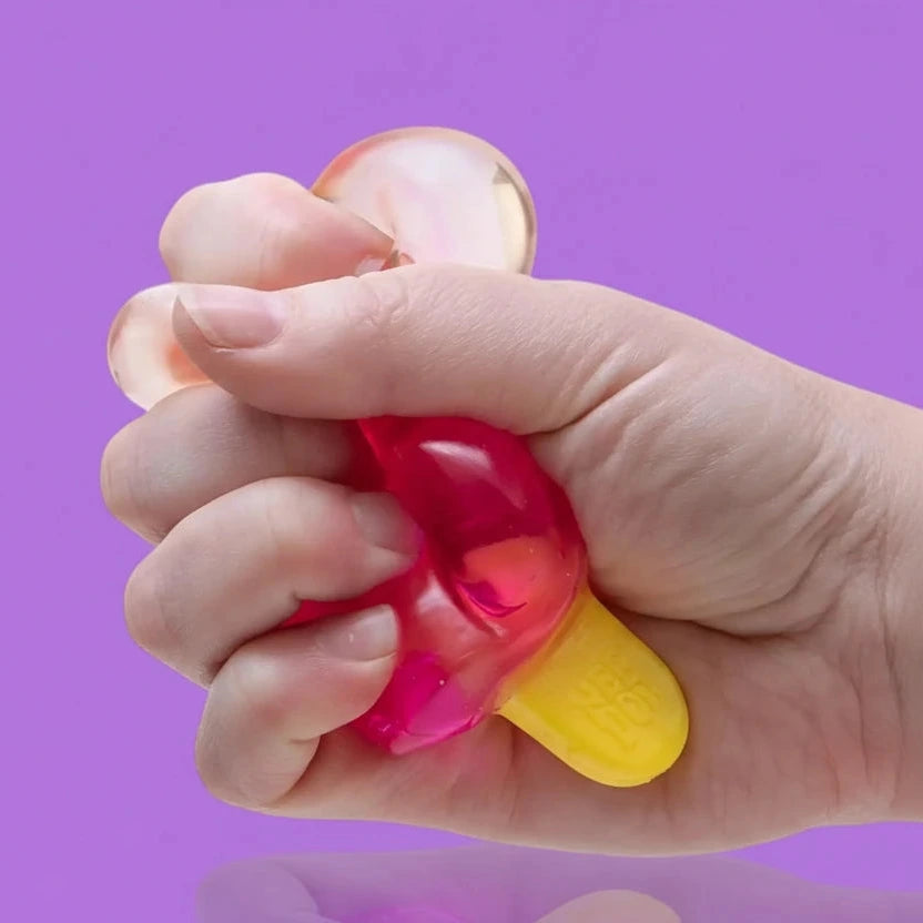 Hand squeezing a pink and yellow stress ball with 'Super Solid Squish!' text on a purple background