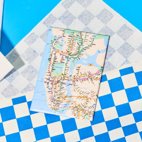 Map of a city on a blue and white checkered surface