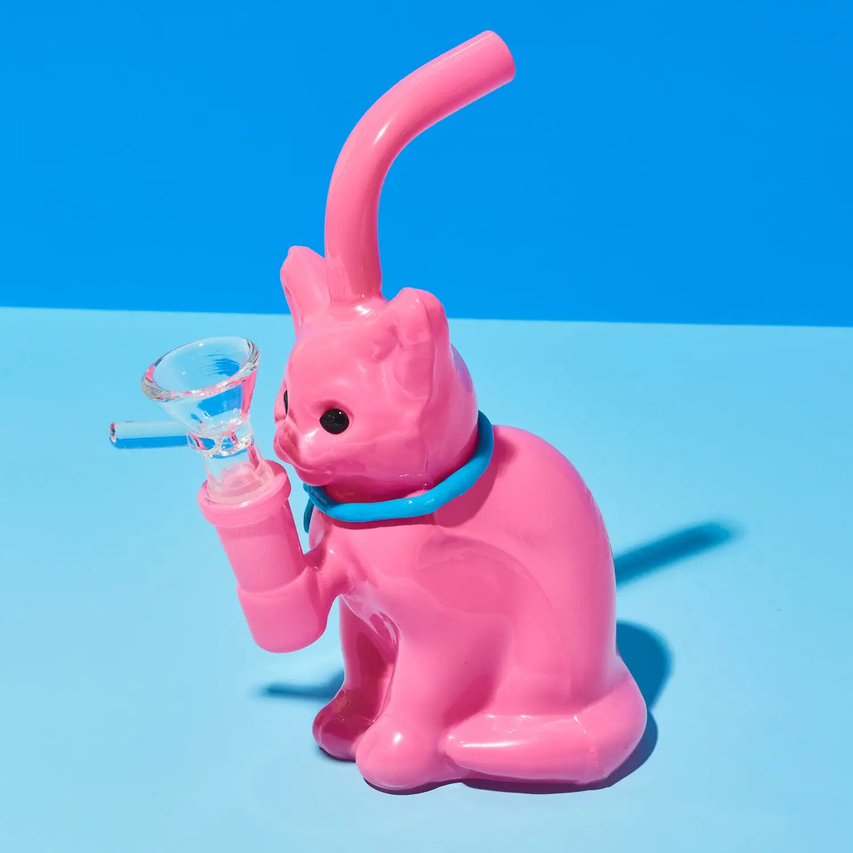 Pink cat-shaped bong with a blue bow