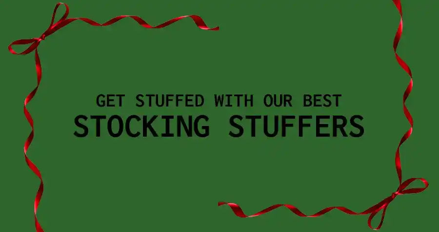 Simple text advertisement for stocking stuffers with red ribbon border on green background.